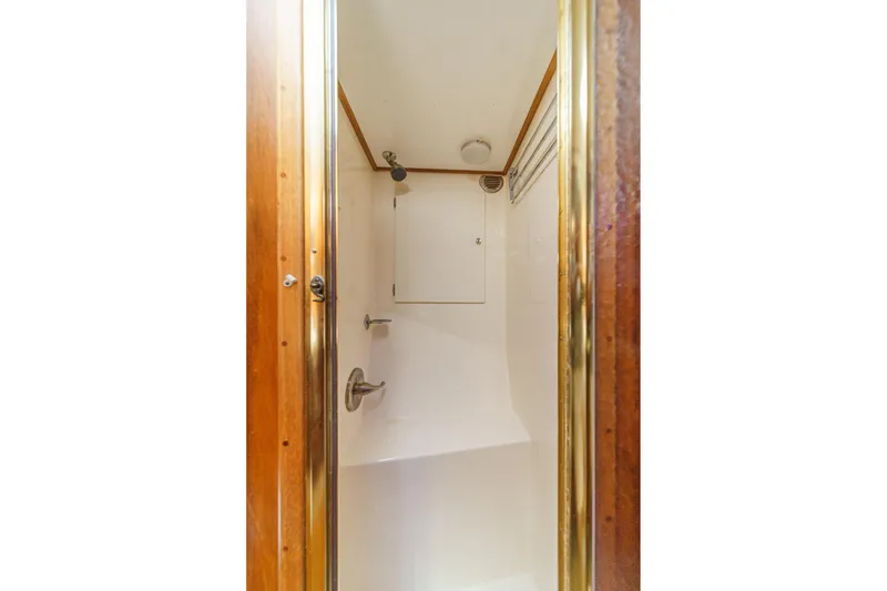 Slide: The Image of Compact shower space with wooden trim in 1984 Post 43 model. - 61