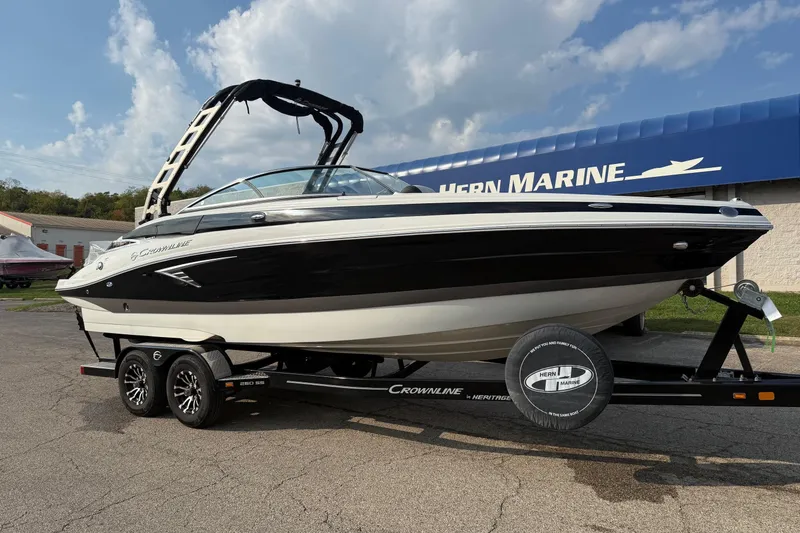 The Image of 2023 Crownline 260 SS boat on trailer at Hern Marine dealership. - 0