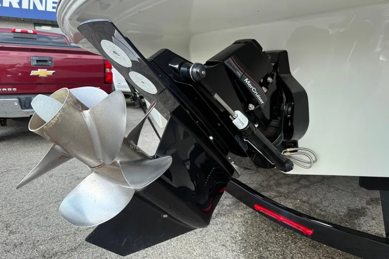 Slide: The Image of 2023 Crownline 260 SS boat with MerCruiser engine and propeller detail. - 12