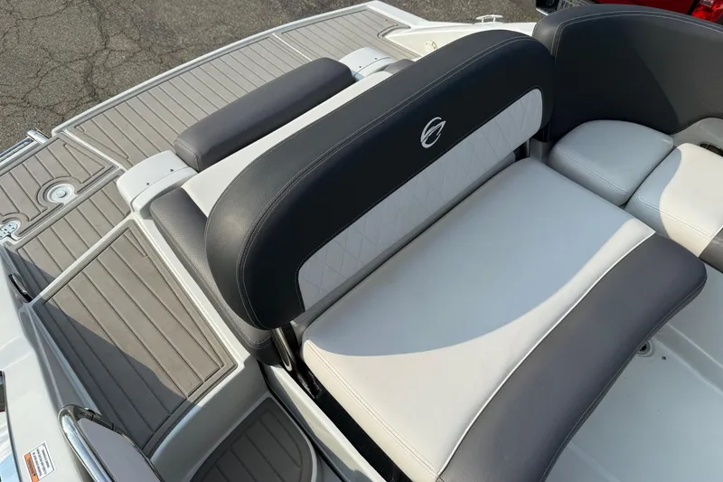 Slide: The Image of 2023 Crownline 260 SS boat seating with gray and white upholstery, featuring a sleek design. - 15