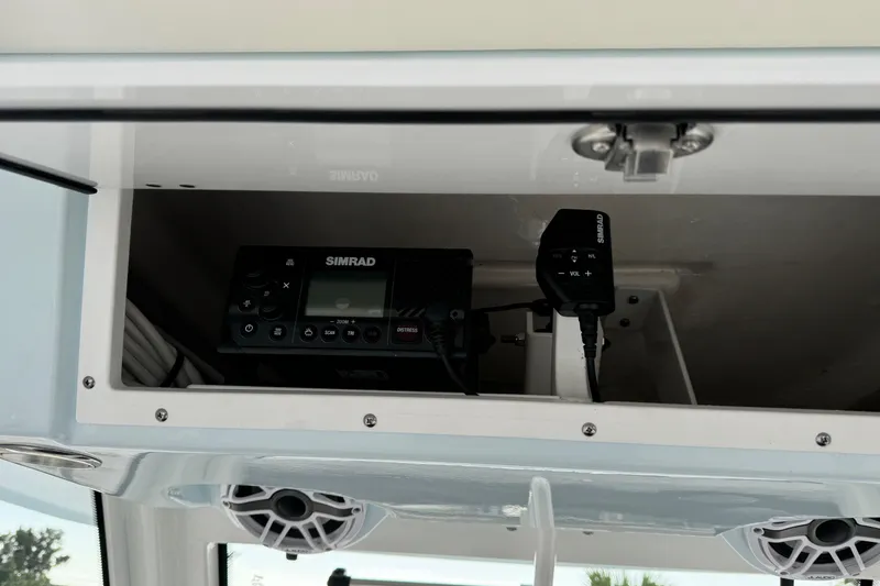 Slide: The Image of 2025 Robalo R360 Center Console with Simrad marine electronics. - 24