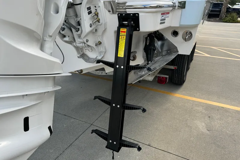 Slide: The Image of 2025 Robalo R360 Center Console boat with a mounted boarding ladder. - 9