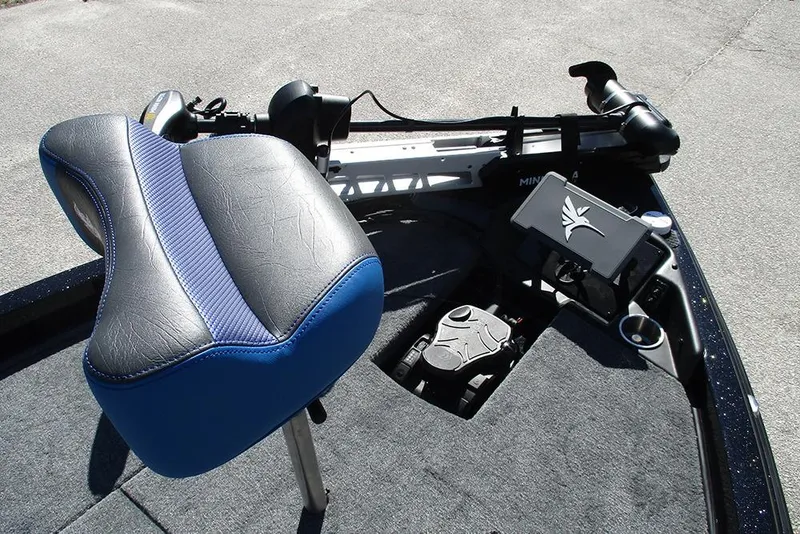 Slide: The Image of 2026 Phoenix 818 Pro boat interior with blue seat and control panel. - 15