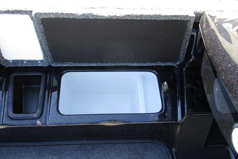 Slide: The Image of Interior storage compartment of 2026 Phoenix 818 Pro boat, featuring sleek design and ample space. - 19