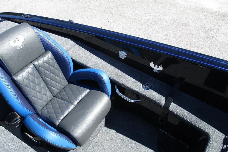 Slide: The Image of Luxurious interior of 2026 Phoenix 818 Pro boat with blue and black seating. - 21