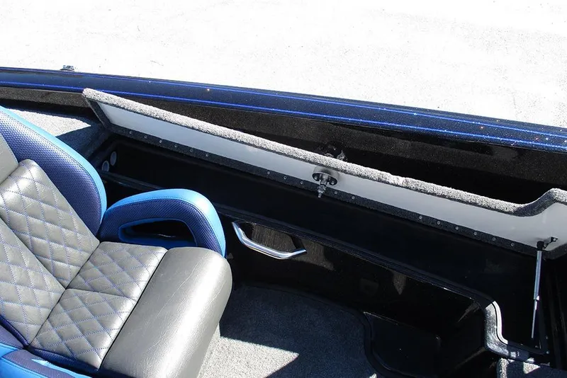 Slide: The Image of Interior of 2026 Phoenix 818 Pro boat with blue and black seating. - 22