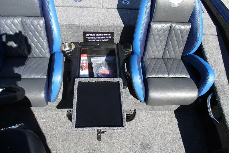 Slide: The Image of Interior of 2026 Phoenix 818 Pro boat with blue and gray seats and storage compartment. - 25