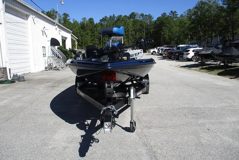 Slide: The Image of 2026 Phoenix 818 Pro boat on trailer in outdoor parking area. - 4