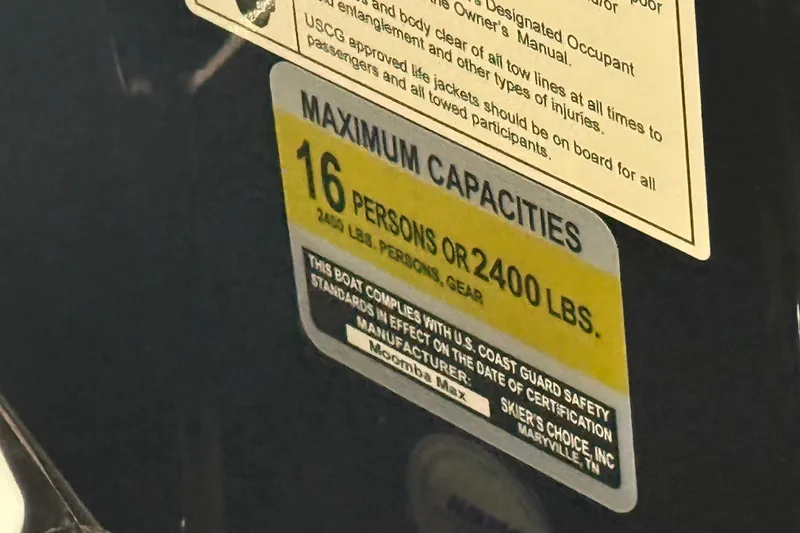 Slide: The Image of Capacity label on 2026 Moomba Max boat, indicating 16 persons or 2400 lbs limit. - 16