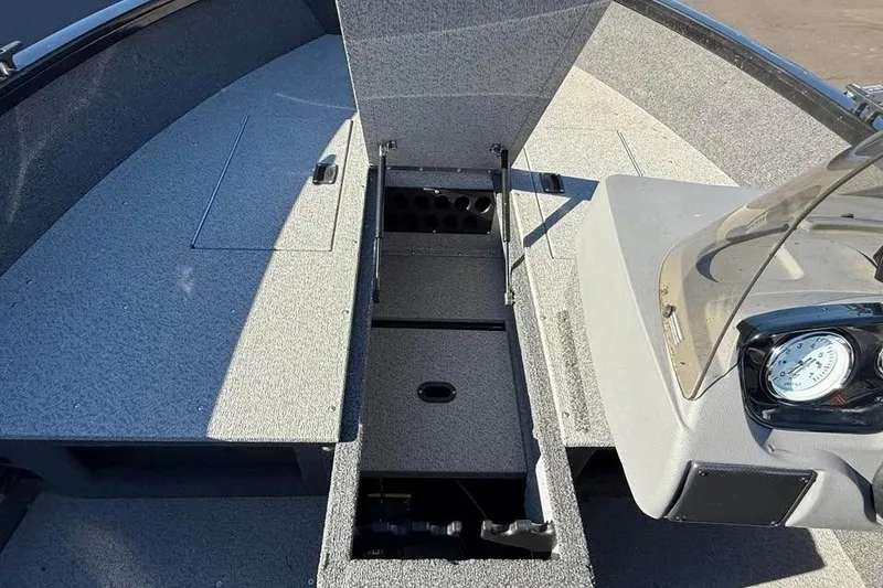 Slide: The Image of 2020 Crestliner 1650 Fish Hawk SE SC boat interior with storage compartments open. - 11