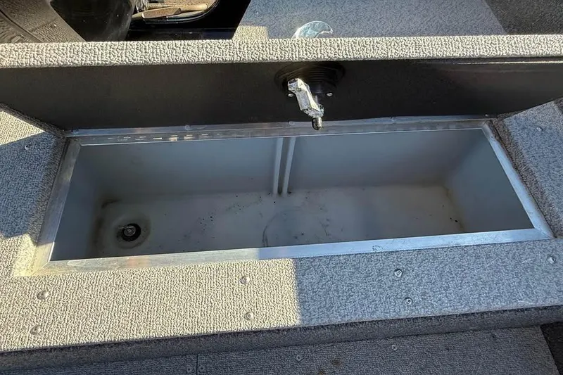Slide: The Image of Open storage compartment in 2020 Crestliner 1650 FISH HAWK SE SC boat. - 8