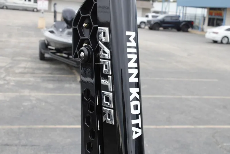Slide: The Image of Minn Kota Raptor on 2026 Skeeter ZXE20 boat in parking lot. - 18