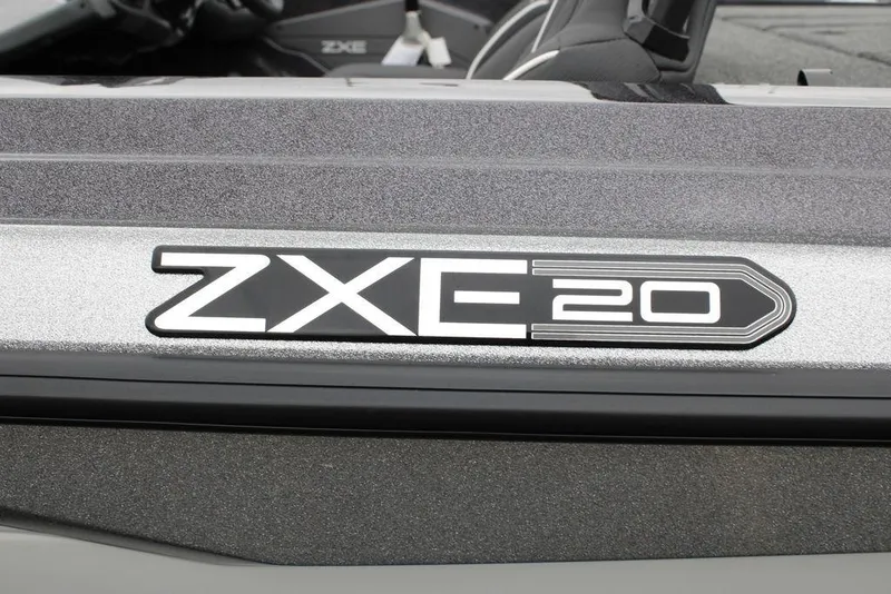 Slide: The Image of 2026 Skeeter ZXE20 boat logo on metallic surface. - 19