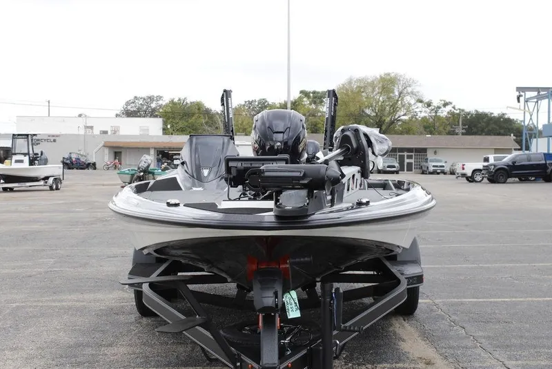 Slide: The Image of 2026 Skeeter ZXE20 boat on trailer in parking lot, front view. - 3