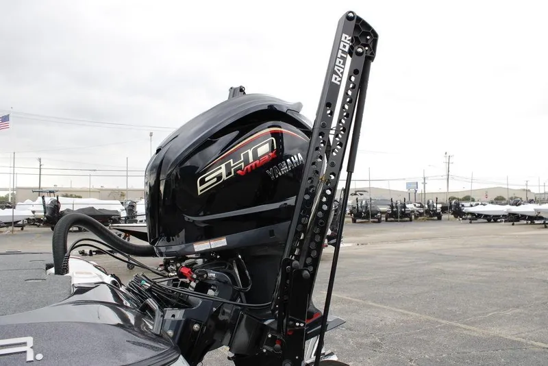 Slide: The Image of 2026 Skeeter ZXE20 boat with Yamaha SHO VMAX engine and Raptor mount in a parking lot. - 5