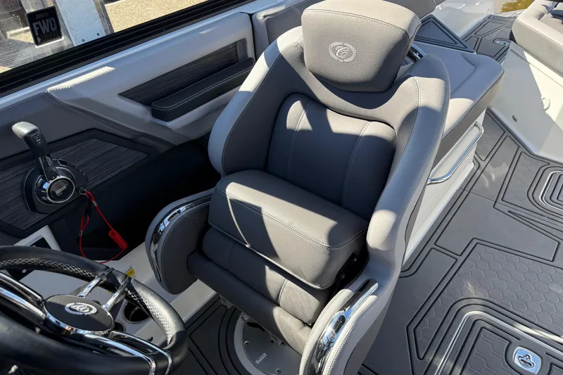 Slide: The Image of 2021 Cobalt R6 Surf boat interior with luxurious gray seating and modern controls. - 10