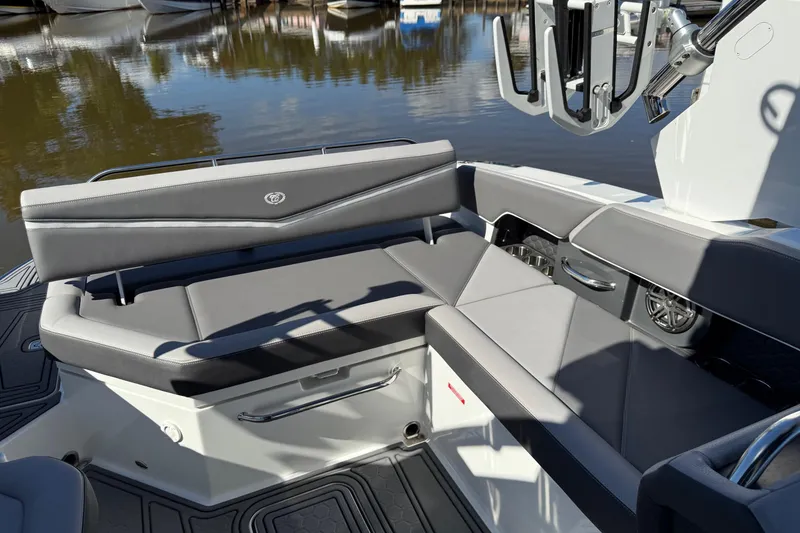 Slide: The Image of 2021 Cobalt R6 Surf boat interior with sleek gray seating and modern design. - 11