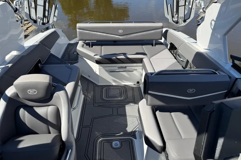 Slide: The Image of 2021 Cobalt R6 Surf boat interior with luxurious gray seating and modern design. - 13