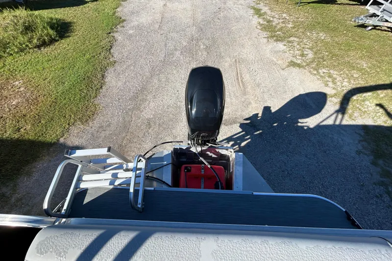 Slide: The Image of 2023 Lowe Ultra 162 Fish & Cruise boat with outboard motor, viewed from above. - 24