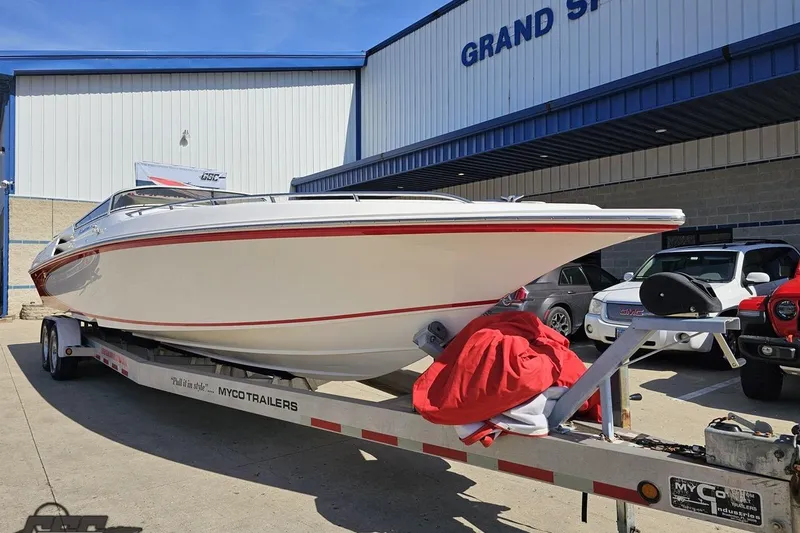 Slide: The Image of 2007 Fountain 35 Lightning boat on trailer outside Grand Sport Center. - 15