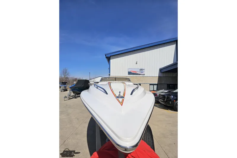 Slide: The Image of 2007 Fountain 35 Lightning boat parked outdoors under clear blue sky. - 17