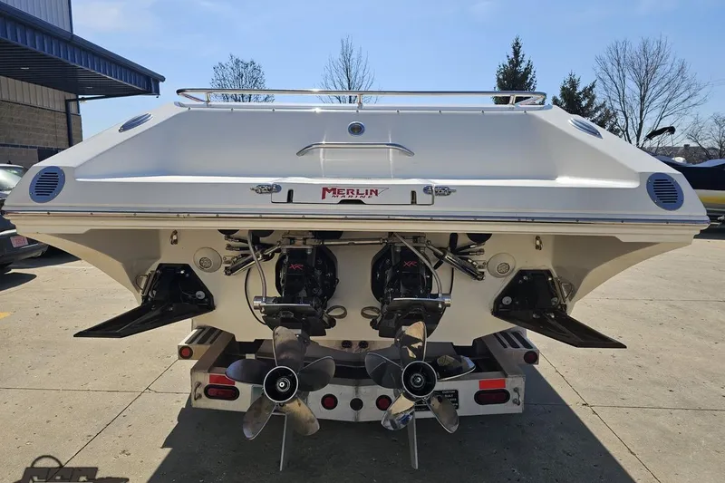 Slide: The Image of 2007 Fountain 35 Lightning boat rear view with dual propellers and sleek design. - 29