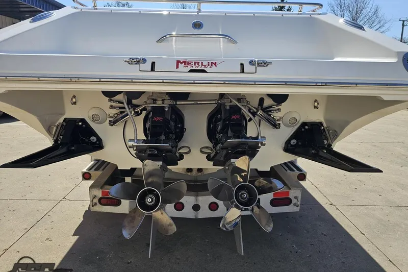 Slide: The Image of Rear view of a 2007 Fountain 35 Lightning boat with dual propellers. - 30