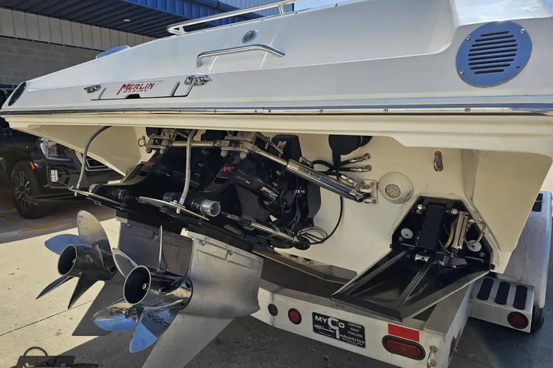 Slide: The Image of Rear view of a 2007 Fountain 35 Lightning boat showing dual propellers and engine details. - 31