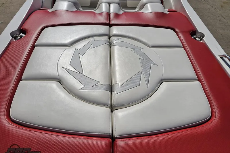 Slide: The Image of 2007 Fountain 35 Lightning boat interior with red and white cushioned seating. - 40
