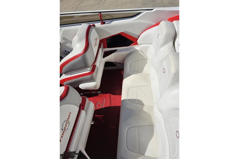 Slide: The Image of 2007 Fountain 35 Lightning boat interior with white and red seating. - 48