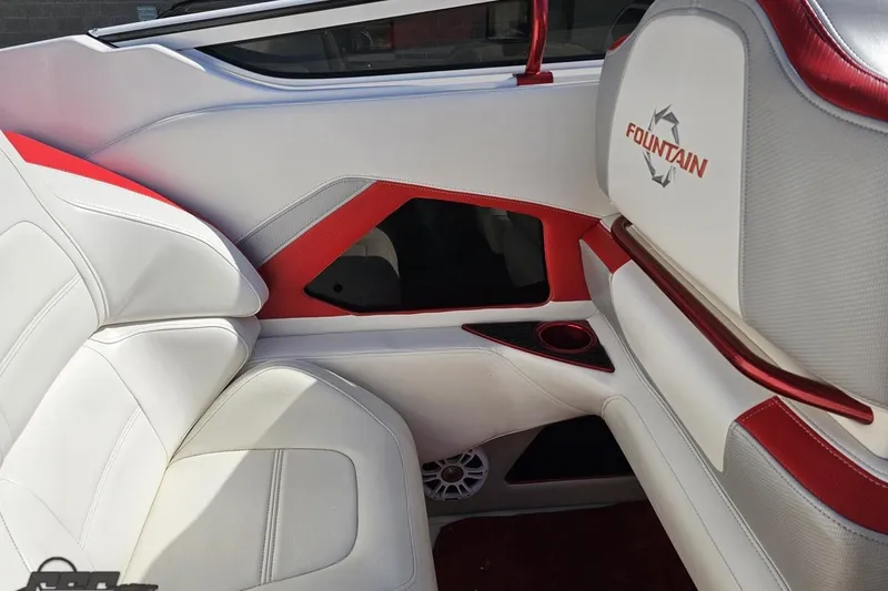 Slide: The Image of 2007 Fountain 35 Lightning boat interior with white and red seating. - 53