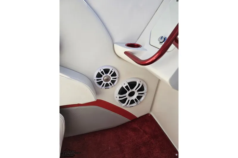 Slide: The Image of Interior of 2007 Fountain 35 Lightning boat with speakers and red accents. - 58
