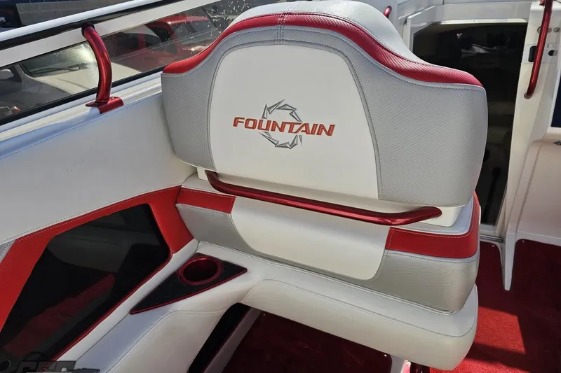 Slide: The Image of 2007 Fountain 35 Lightning boat interior with red and white seating. - 59