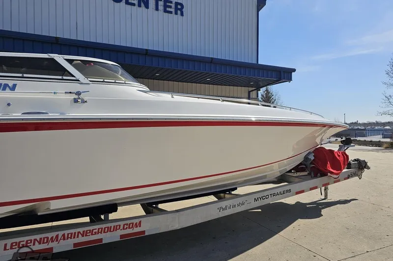 Slide: The Image of 2007 Fountain 35 Lightning boat on trailer outside marine center. - 6