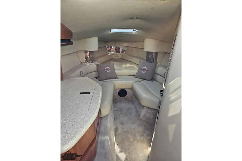 Slide: The Image of 2007 Fountain 35 Lightning boat interior with beige seating and cushions. - 72