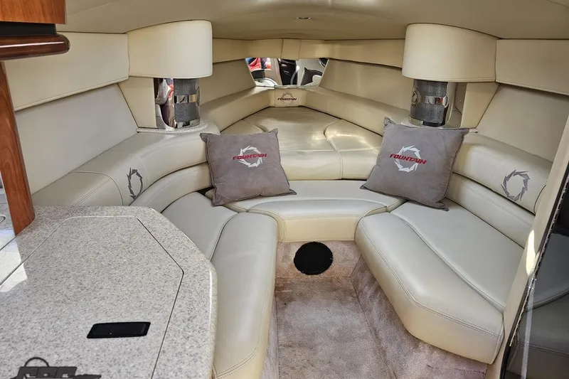 Slide: The Image of Luxurious interior of 2007 Fountain 35 Lightning boat with plush seating and branded cushions. - 73