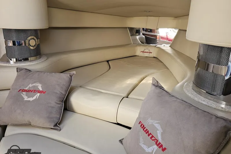 Slide: The Image of Luxurious interior of a 2007 Fountain 35 Lightning boat with branded cushions. - 74