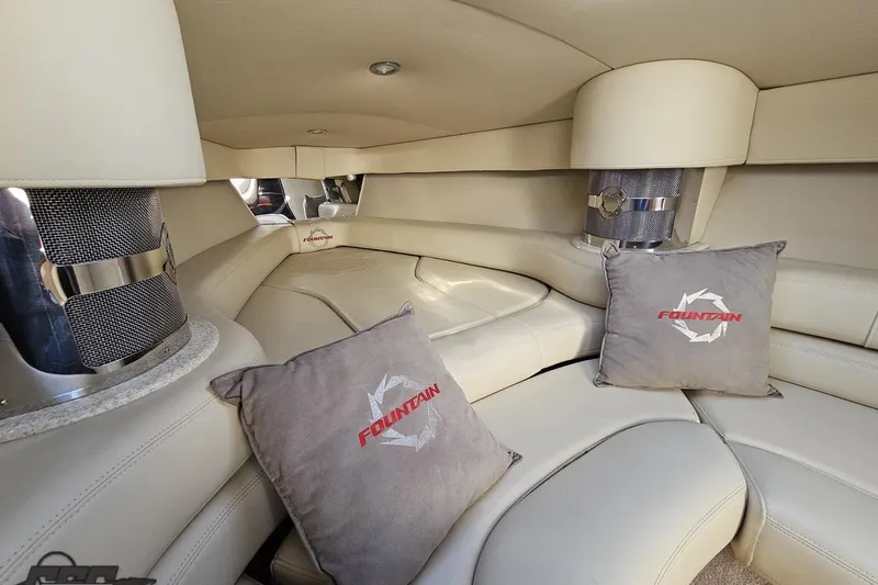 Slide: The Image of Luxurious interior of a 2007 Fountain 35 Lightning boat with plush seating and branded cushions. - 75