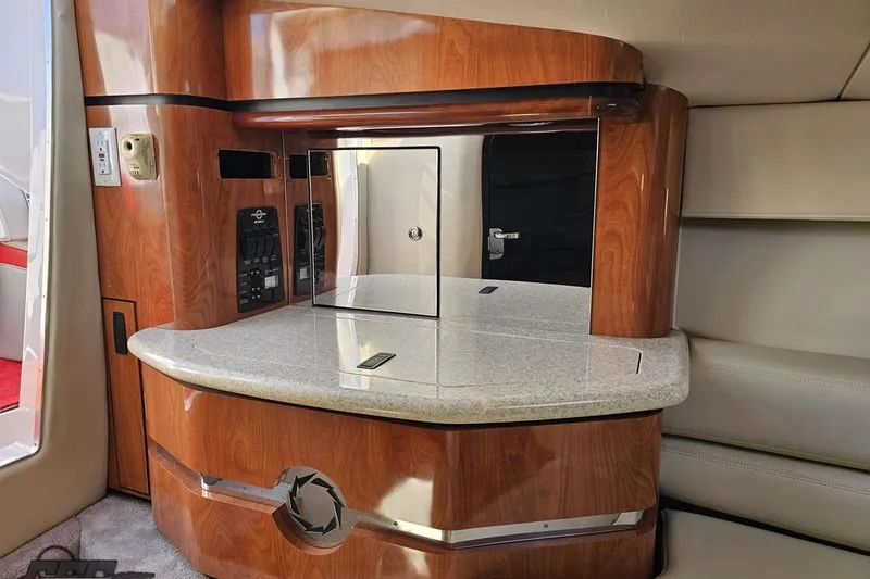 Slide: The Image of Luxurious interior of 2007 Fountain 35 Lightning boat with wood finish and modern amenities. - 80