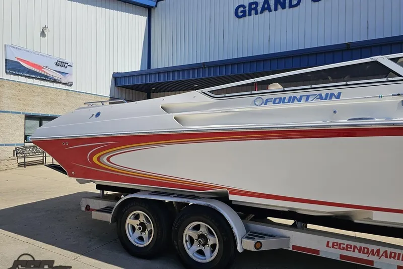 Slide: The Image of 2007 Fountain 35 Lightning boat on trailer outside Grand Sport Center. - 9