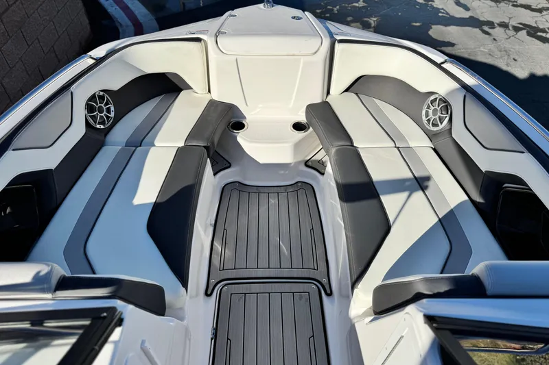 Slide: The Image of 2022 Yamaha Boats 212SE interior with sleek seating and modern design. - 17