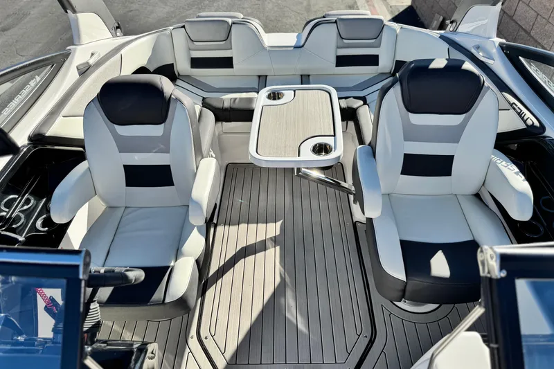 Slide: The Image of 2022 Yamaha Boats 212SE interior with sleek seating and modern design. - 19