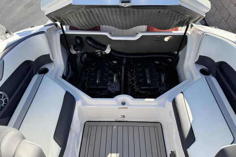 Slide: The Image of 2022 Yamaha Boats 212SE engine compartment with dual high-output engines. - 21