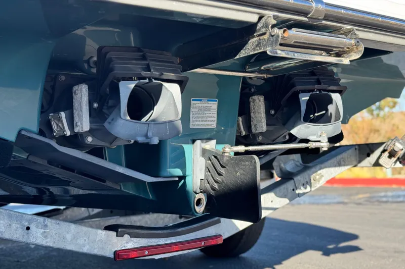 Slide: The Image of Rear view of 2022 Yamaha Boats 212SE jet propulsion system on trailer. - 8