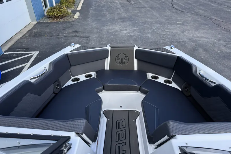 Slide: The Image of 2026 Scarab 210 LX boat interior with sleek seating and modern design. - 29