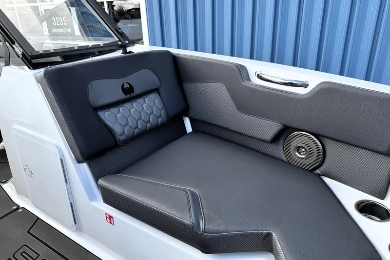 Slide: The Image of 2026 Scarab 210 LX boat interior with sleek seating and modern design elements. - 32