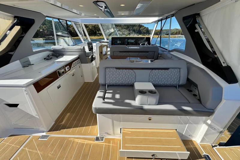 Slide: The Image of Luxurious 2025 Regal LX43 yacht interior with elegant seating and modern amenities. - 29