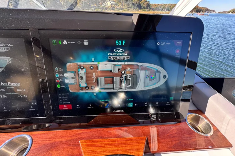 Slide: The Image of Touchscreen display on 2025 Regal LX43 boat showing navigation and system controls. - 41