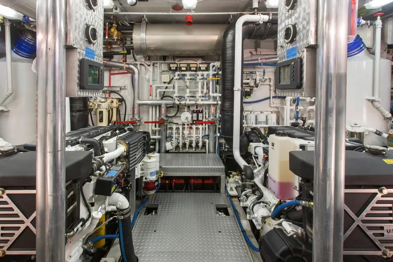 Slide: The Image of Engine room of a 1978 Burger yacht with complex machinery and control panels. - 51