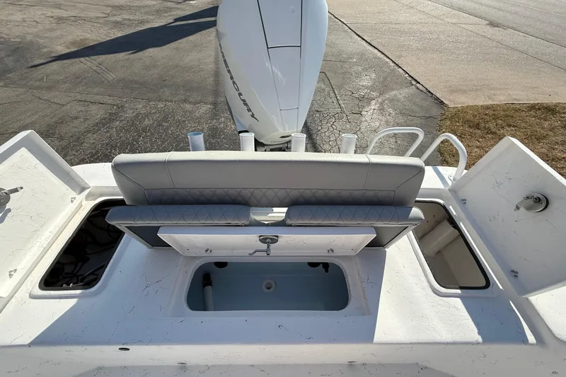 Slide: The Image of 2026 Blazer Bay 2400 boat interior with seating and storage compartments. - 11